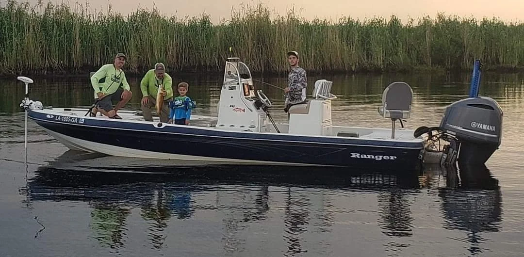 Captain Doc's 23-foot Ranger bay boat on the water